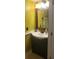 Small bathroom with vanity, sink, and toilet at 11407 Bentry St, Orlando, FL 32824