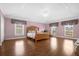 Large main bedroom with king bed and hardwood floors at 11407 Bentry St, Orlando, FL 32824