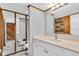 Modern bathroom with white vanity and marble-look floors at 1502 Ne Buckeye Ne Rd # 2, Winter Haven, FL 33881