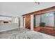 Open concept dining area with marble floors and kitchen view at 1502 Ne Buckeye Ne Rd # 2, Winter Haven, FL 33881