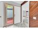 Bright entryway with a view to the living area and access to a patio at 1502 Ne Buckeye Ne Rd # 2, Winter Haven, FL 33881
