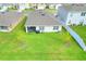 Aerial view showcasing a home's backyard and landscaping at 2638 Galway Grove Way, Lakeland, FL 33811