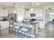 Modern kitchen with stainless steel appliances and an island at 2638 Galway Grove Way, Lakeland, FL 33811