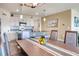 Kitchen and dining area combo with wood table and six chairs at 2638 Galway Grove Way, Lakeland, FL 33811