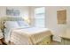 Bright bedroom with a comfortable bed and stylish decor at 2638 Galway Grove Way, Lakeland, FL 33811