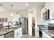 Kitchen featuring a large pantry and stainless steel appliances at 2638 Galway Grove Way, Lakeland, FL 33811