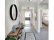 Bright and spacious entryway with a console table and mirror at 2638 Galway Grove Way, Lakeland, FL 33811