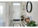 Clean entryway with white door and decorative elements at 2638 Galway Grove Way, Lakeland, FL 33811