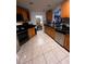 Bright kitchen with ample cabinetry and stainless steel appliances at 804 Mountbatten Ln, Kissimmee, FL 34758