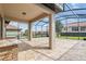 Relaxing screened patio overlooking backyard at 4227 Prima Lago Dr, Lakeland, FL 33810