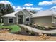 House exterior showcasing a metal roof and stone accents at 1835 S Lake Reedy Blvd, Frostproof, FL 33843