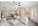 Living room with stylish furniture and kitchen view at 6319 Nw 67 Ter, Ocala, FL 34482
