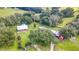 Aerial view of property showing two log cabins and outbuildings at 4292 Sw 73Rd Trl, Bushnell, FL 33513