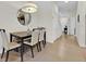 View of dining room with access to hallway at 17531 Placidity Ave, Clermont, FL 34714