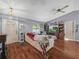 Living room with hardwood floors and a cozy seating area at 5337 Jacob Ave, Polk City, FL 33868