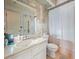 Bathroom with a toilet, sink, and shower/tub combo at 5337 Jacob Ave, Polk City, FL 33868