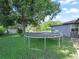 Large backyard with trampoline and mature trees at 5337 Jacob Ave, Polk City, FL 33868