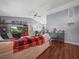 Living room with a sofa, TV, and fireplace at 5337 Jacob Ave, Polk City, FL 33868