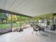 Spacious screened porch with seating and backyard views at 5337 Jacob Ave, Polk City, FL 33868