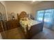 Guest bedroom with a full-size bed and ample closet space at 24502 Parlange Ct, Leesburg, FL 34748