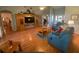 Bright living room featuring hardwood floors and comfy seating at 24502 Parlange Ct, Leesburg, FL 34748