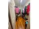 Large walk-in closet with ample shelving and hanging space at 24502 Parlange Ct, Leesburg, FL 34748