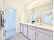 Double vanity bathroom with modern finishes at 29912 Cypress Pointe, Deer Island, FL 32778