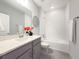Bright bathroom with tub, shower, and vanity at 29912 Cypress Pointe, Deer Island, FL 32778