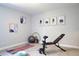 Home gym with yoga mat, weights, and exercise bench at 29912 Cypress Pointe, Deer Island, FL 32778