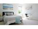 Well-lit bedroom with built-in desk and window seat at 29912 Cypress Pointe, Deer Island, FL 32778