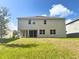 Two-story house with backyard at 29912 Cypress Pointe, Deer Island, FL 32778