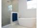 Modern bathroom with a freestanding tub and walk-in shower at 29912 Cypress Pointe, Deer Island, FL 32778
