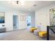 Open loft area with multiple rooms and access to a hallway at 29912 Cypress Pointe, Deer Island, FL 32778