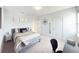 Serene bedroom with a desk and calming decor at 29912 Cypress Pointe, Deer Island, FL 32778