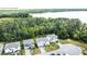 Aerial view of house and surrounding landscape at 29912 Cypress Pointe, Deer Island, FL 32778