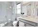Clean bathroom with shower, toilet, and vanity at 29912 Cypress Pointe, Deer Island, FL 32778