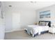 Cozy bedroom with a comfortable bed and calming decor at 29912 Cypress Pointe, Deer Island, FL 32778