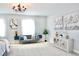 Comfortable main bedroom with a sitting area and large windows at 29912 Cypress Pointe, Deer Island, FL 32778