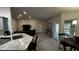 Open concept kitchen with an island and view of living area at 9832 Sw 46Th Ct, Ocala, FL 34476