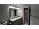 Bathroom with double sinks and shower at 9832 Sw 46Th Ct, Ocala, FL 34476