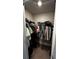 Large walk-in closet with ample hanging and shelf space at 9832 Sw 46Th Ct, Ocala, FL 34476