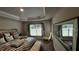 Spacious main bedroom with king-size bed and large mirror at 9832 Sw 46Th Ct, Ocala, FL 34476