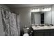 Bathroom with double sinks and shower at 9832 Sw 46Th Ct, Ocala, FL 34476
