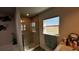 Modern bathroom with shower and bathtub at 9832 Sw 46Th Ct, Ocala, FL 34476