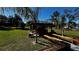 A backyard gazebo with wooden benches perfect for outdoor relaxation at 9832 Sw 46Th Ct, Ocala, FL 34476