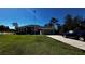 One-story home with gray exterior and landscaped yard at 9832 Sw 46Th Ct, Ocala, FL 34476