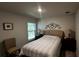 Bright bedroom with a double bed and window at 9832 Sw 46Th Ct, Ocala, FL 34476