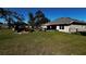 View of the backyard showing a gazebo, patio, and a chain link fence at 9832 Sw 46Th Ct, Ocala, FL 34476