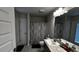 Bathroom with shower and single vanity at 9832 Sw 46Th Ct, Ocala, FL 34476