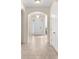 Bright and airy entryway with tile flooring and arched doorways at 1532 Eagle Ridge Dr, Lakeland, FL 33813